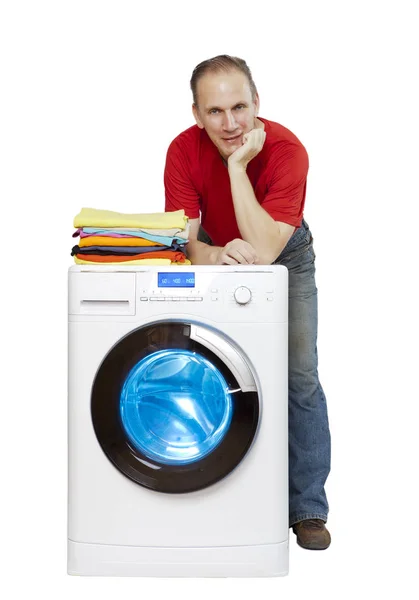 Happy Man Smiling Standing Next New Washing Machine Stack Clean — Stock Photo, Image