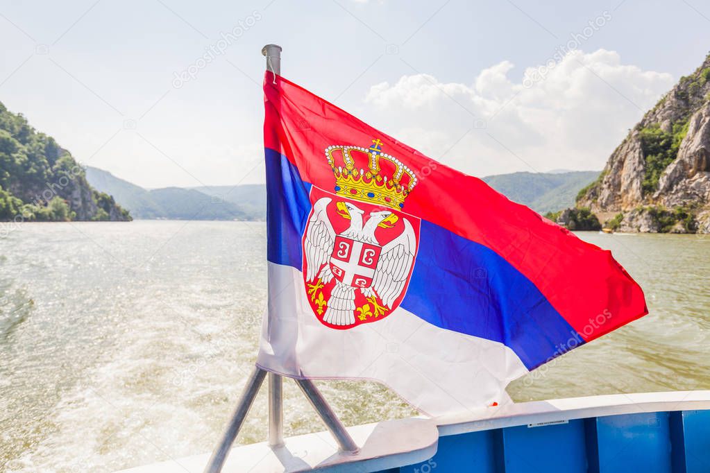 Serbia national flag on tourist boat 