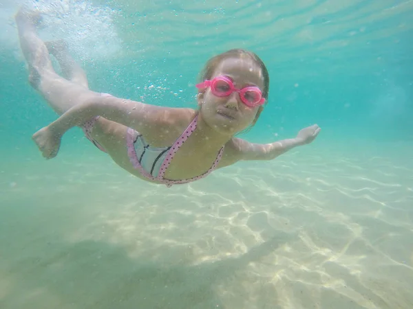 Happy child underwater portrait swimming and dive in the sea — Stock Photo, Image