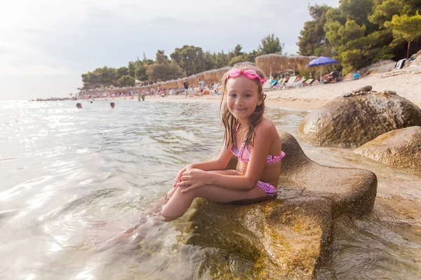 Happy child on the sand beach — Stock Photo, Image