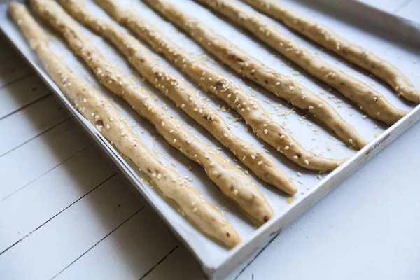 Unbaked homemade bread spelt sticks — Stock Photo, Image