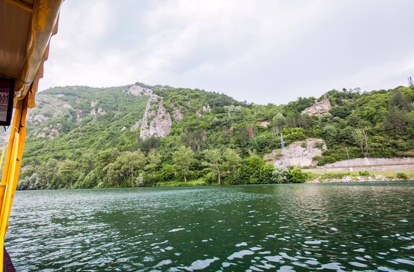 Rivers cruise ship on Drina river, nature landscape , summer daylight, travel vacation concept, Bosnia and Herzegovina.