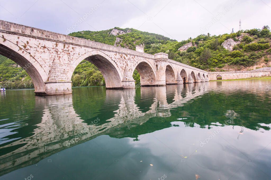 Historic bridge over the Drina River, Famous Tourist Attraction, The Mehmed Pasa Sokolovic Bridge in Visegrad, Bosnia and Herzegovina.