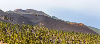Volcanic landscape along   Ruta de los Volcanes, beautiful hiking path over the volcanoes, La Palma, Canary Islands clipart