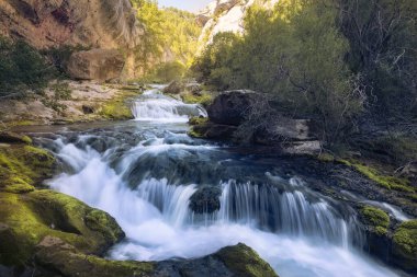 The Source of the Pitarque River in Teruel, Spain clipart