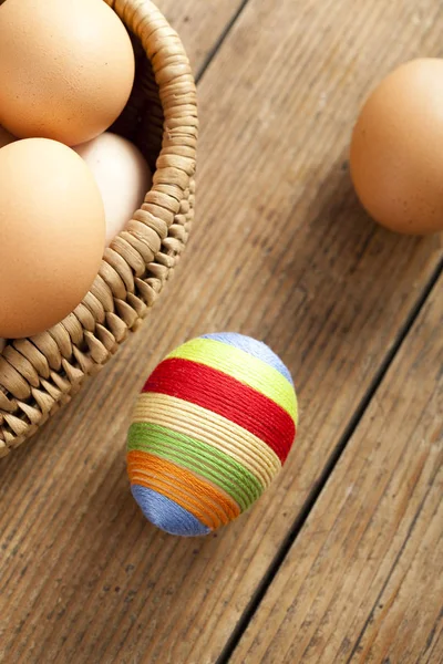 Easter egg covered with woolen yarn — Stock Photo, Image