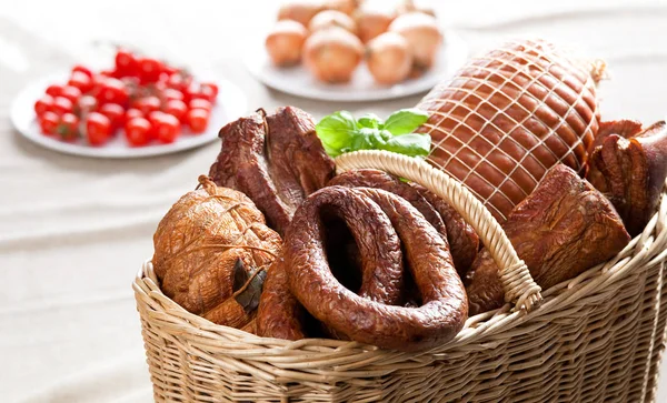 Cold meats in a basket — Stock Photo, Image