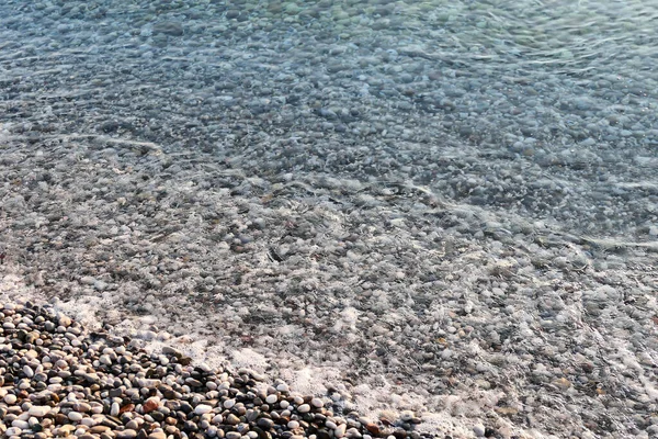 水中での小石 海の背景 — ストック写真
