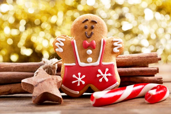 christmas food. christmas gingerbread man on wooden table