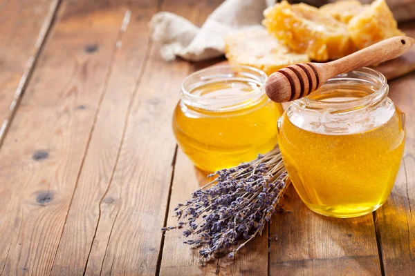 jar of lavender honey with honeycombs