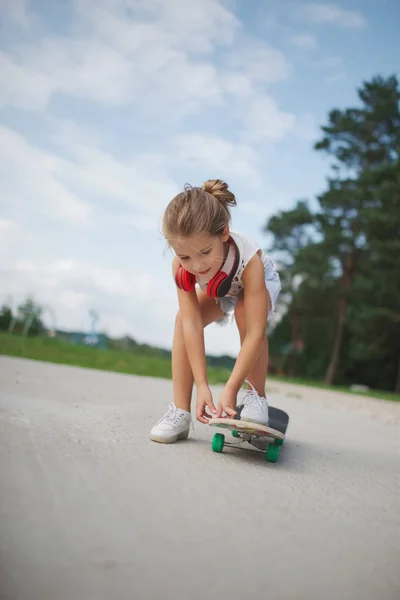 Happy little girl with long hair — Stock Photo, Image