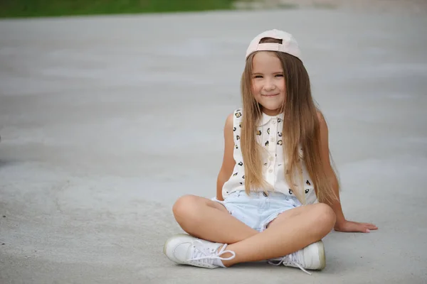 Happy little girl with long hair — Stock Photo, Image