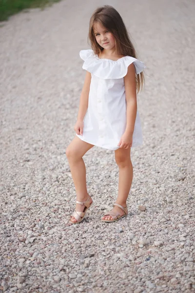 Happy little girl with long hair — Stock Photo, Image