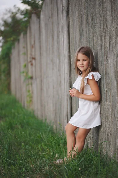 Happy little girl with long hair — Stock Photo, Image