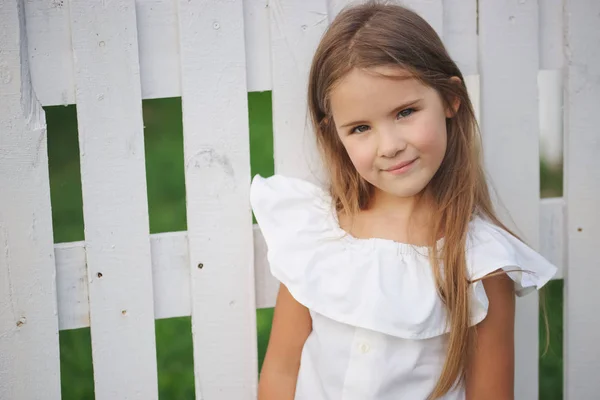 Happy little girl with long hair — Stock Photo, Image