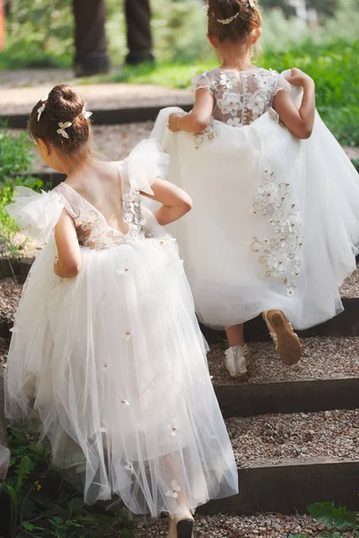 Happy beautiful girls with white wedding dresses — Stock Photo, Image