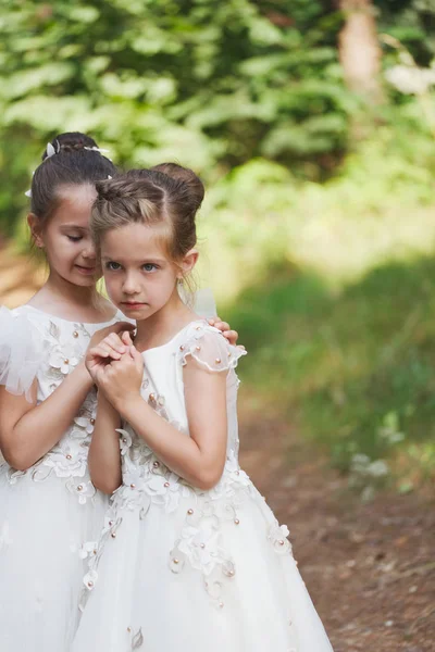 Happy beautiful girls with white wedding dresses — Stock Photo, Image