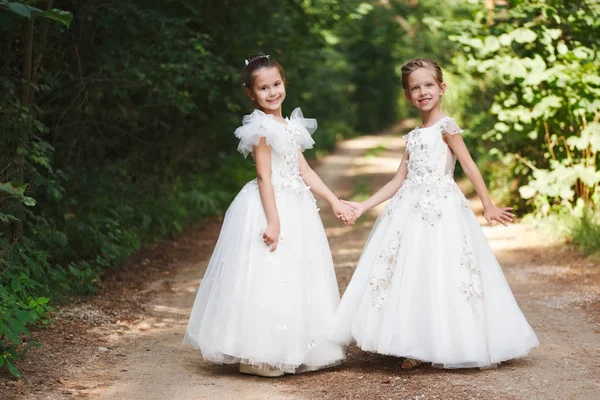 Happy beautiful girls with white wedding dresses — Stock Photo, Image