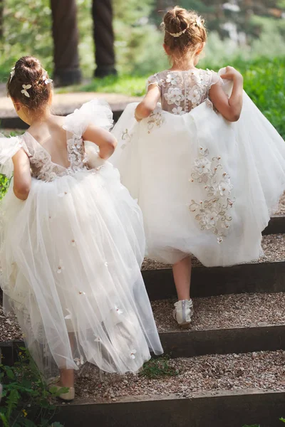 Happy beautiful girls with white wedding dresses — Stock Photo, Image