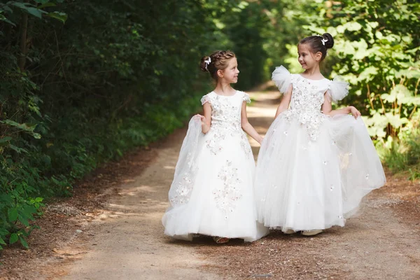 Happy beautiful girls with white wedding dresses — Stock Photo, Image