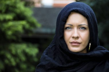 Muslim lady in scarf clipart