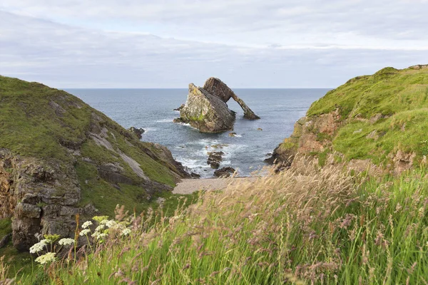 Bow-fidle Rock landscape on the coast of Scotland on cloudy afte