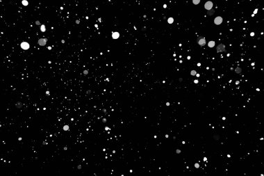 Kar fırtınası doku. Siyah arka plan, ışıkları bokeh vurdu kar taneleri havada uçan