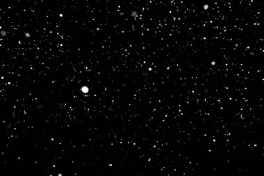 Kar fırtınası doku. Siyah arka plan, ışıkları bokeh vurdu kar taneleri havada uçan