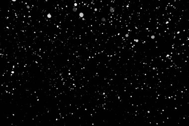 Kar fırtınası doku. Siyah arka plan, ışıkları bokeh vurdu kar taneleri havada uçan