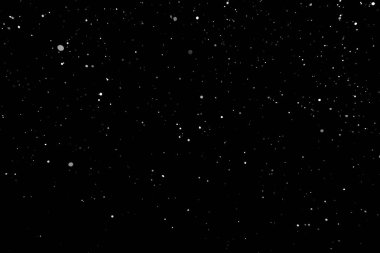 Kar fırtınası doku. Siyah arka plan, ışıkları bokeh vurdu kar taneleri havada uçan