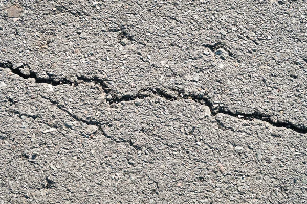 Sprucken Asfalt Bakgrund Närbild — Stockfoto