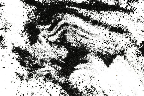 白い背景に黒の粉を隔離 — ストック写真