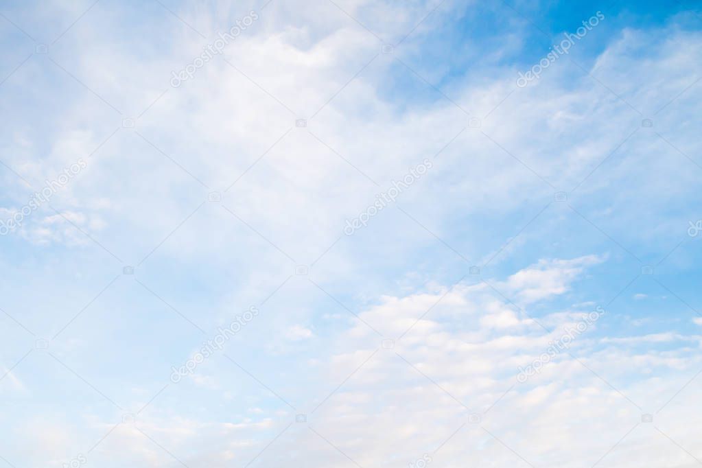 cirrus clouds on blue sky background