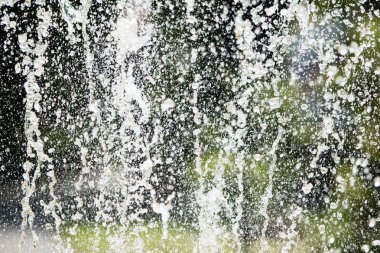 Su çeşme, bulanık arka plan, soyutlama jetleri