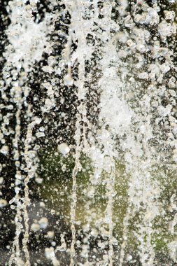 Su çeşme, bulanık arka plan, soyutlama jetleri