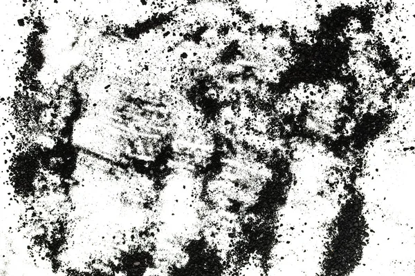 Isolated black powder on a white background