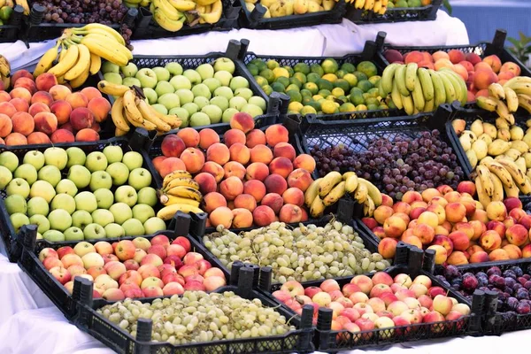 ripe fruits on the counters in market