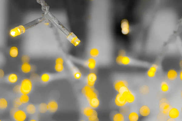 ボケ味の黄色ライト ガーランド背景 — ストック写真