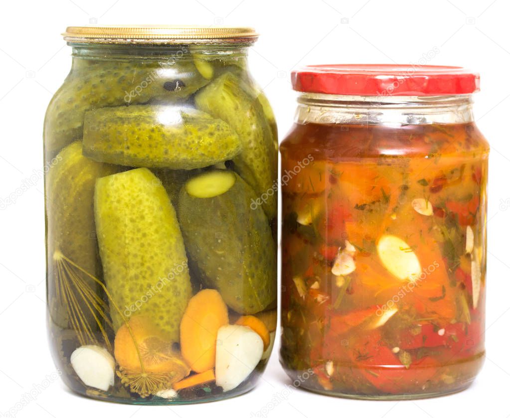 cucumber and pepper Lecho in glass jar on white background