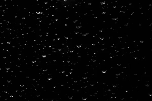Siyah Cam Islak Cam Doku Üzerinde Yağmur Damlaları — Stok fotoğraf