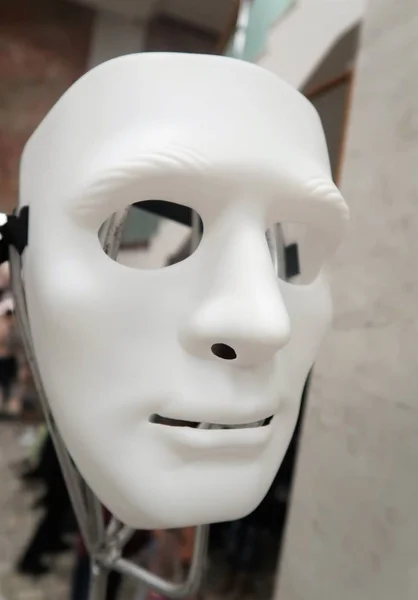 Close up view of white plastic robotic face