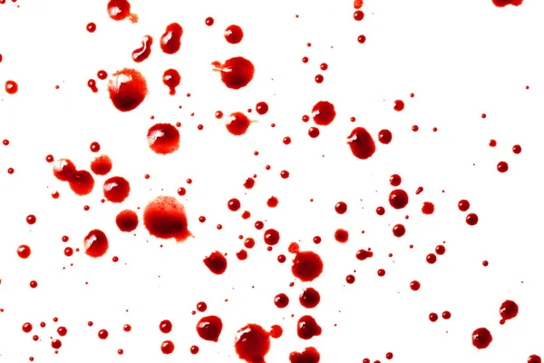 beyaz kağıt üzerine kırmızı kan damlaları