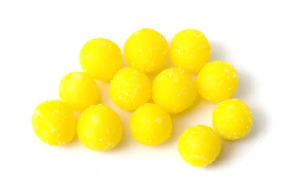 Bonbons Ronds Sucre Jaune Sur Blanc — Photo