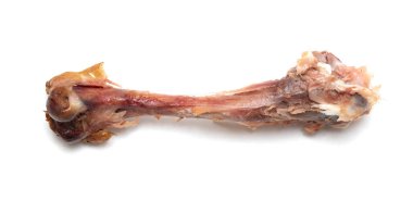 beyaz bir arka plan üzerinde yedikten sonra tavuk kemikleri