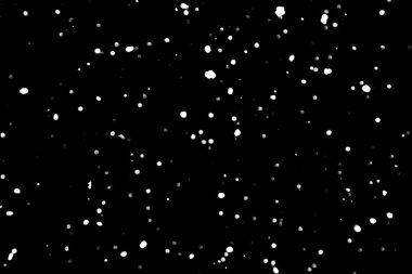 siyah kar bokeh arka plan üzerinde beyaz noktalar