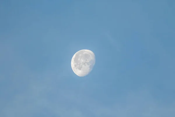 beautiful view of moon on blue sky