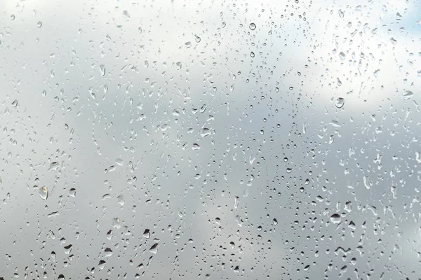 Gotas Lluvia Sobre Fondo Cristal Cielo —  Fotos de Stock