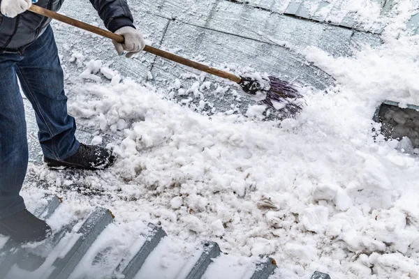 broom on snow snow removal