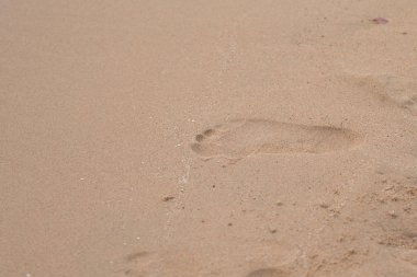 kum, deniz plaj ayak izleri