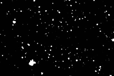 siyah kar bokeh arka plan üzerinde beyaz noktalar